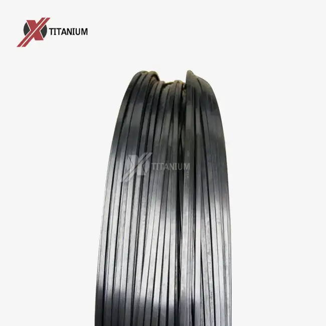 What specific types of medical devices use titanium flat wire?